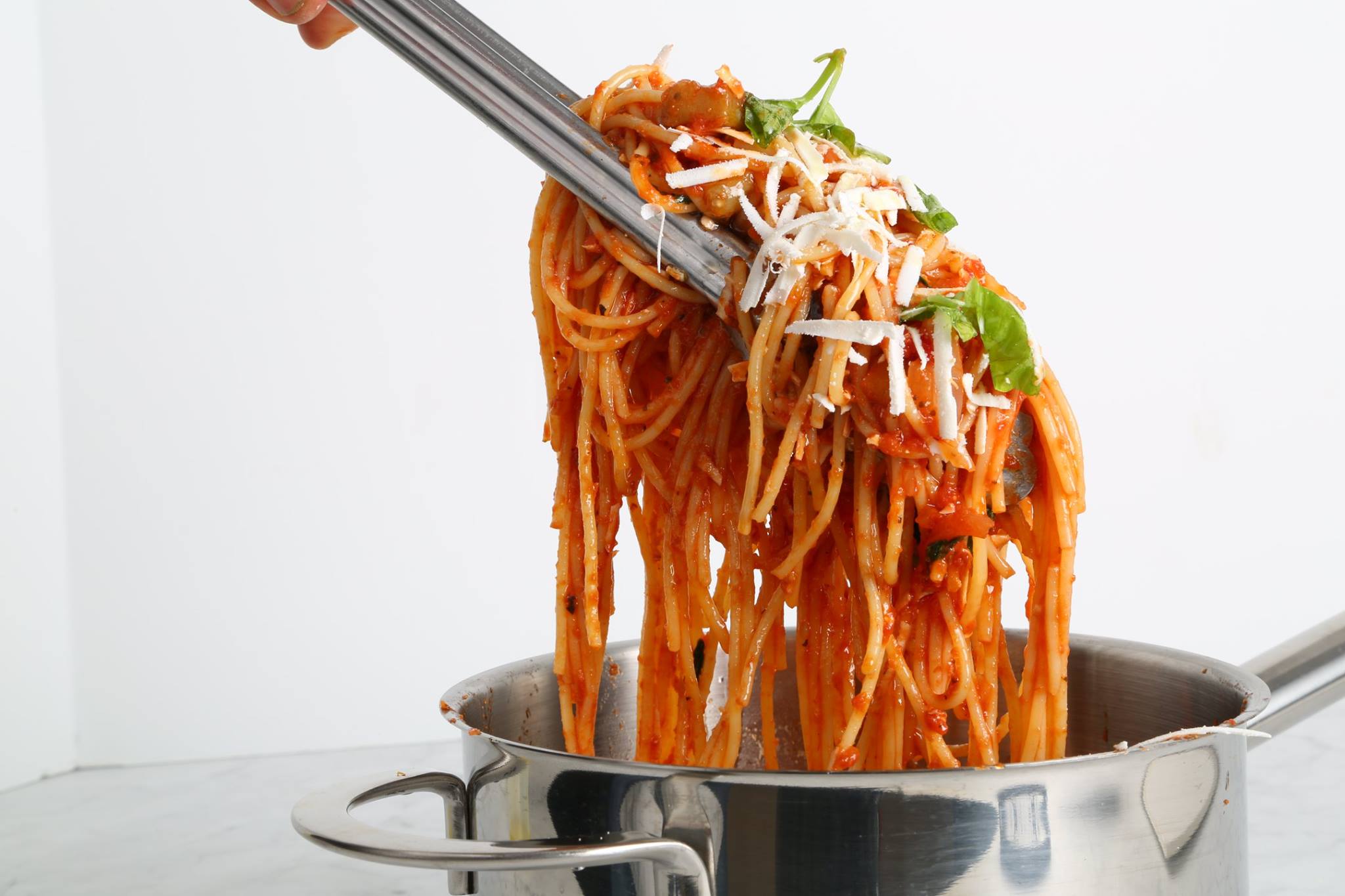 Pasta alla Norma Spaghetti Recipe with fried Eggplants, Ricotta, and Basil