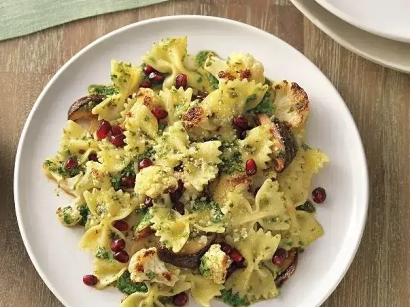 Farfalle Pasta with Barilla® Rustic Basil Pesto Cauliflower and Pomegranate Seeds Recipe | US_PROD-a64e66c4-97ec-4cc5-bfbf-21b50604c802