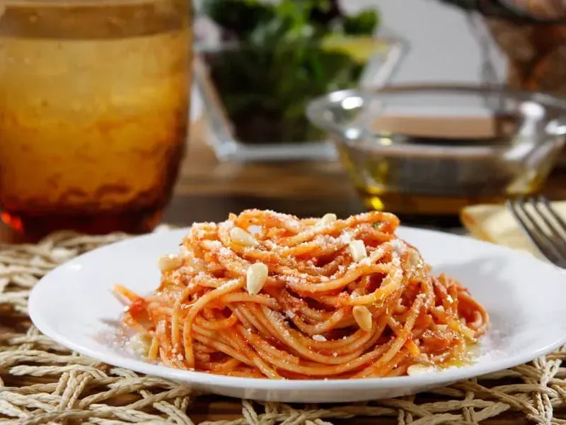Protein+® Spaghetti with Barilla® Tomato & Basil Sauce, Romano Cheese and Pine Nuts Recipe | US_PROD-1a6f1926-ec54-4c68-b233-7fdb53a02172