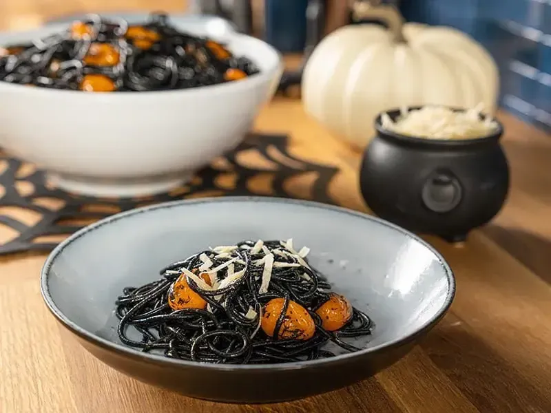 Barilla® Spooky Halloween Pasta with Squid Ink, Orange Grape Tomatoes and Shredded Parmesan Cheese Recipe | US_PROD-78ee5a0d-3789-4eb4-80c6-c4b189451c06