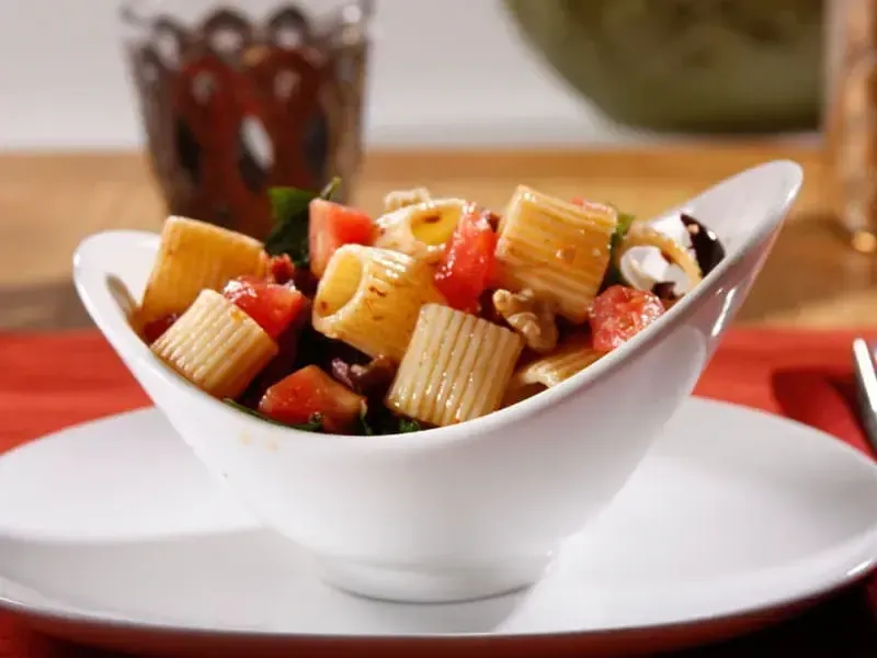 Barilla® Mezzi Rigatoni Pasta with Fresh & Sundried Tomatoes, Black Olives and Toasted Walnuts Recipe | US_PROD-b871ddd4-0592-430d-bce6-4326afd218b7