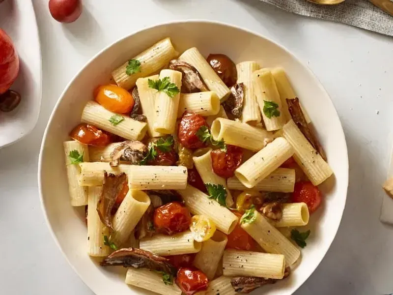 Barilla® Rigatoni Pasta with Shallots, Porcini Mushrooms and Heirloom Tomatoes Recipe | US_PROD-c7e70da9-a1b1-4e63-93ee-15f59b2177f4