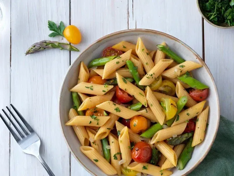 Barilla® Chickpea Penne Pasta with Shallot, Asparagus and Cherry Tomatoes Recipe | US_PROD-13e286a5-9bb5-471d-ab7a-d160a3b70525