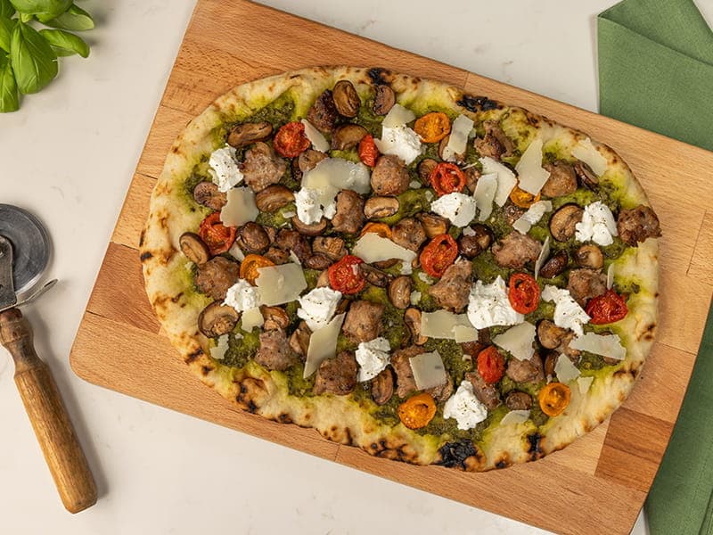 Barilla® Sausage and Mushroom with Parmigiano-Reggiano Cheese Pesto Pizza Recipe | US_PROD-3386b09b-19f3-444f-a26b-1b923fd05769