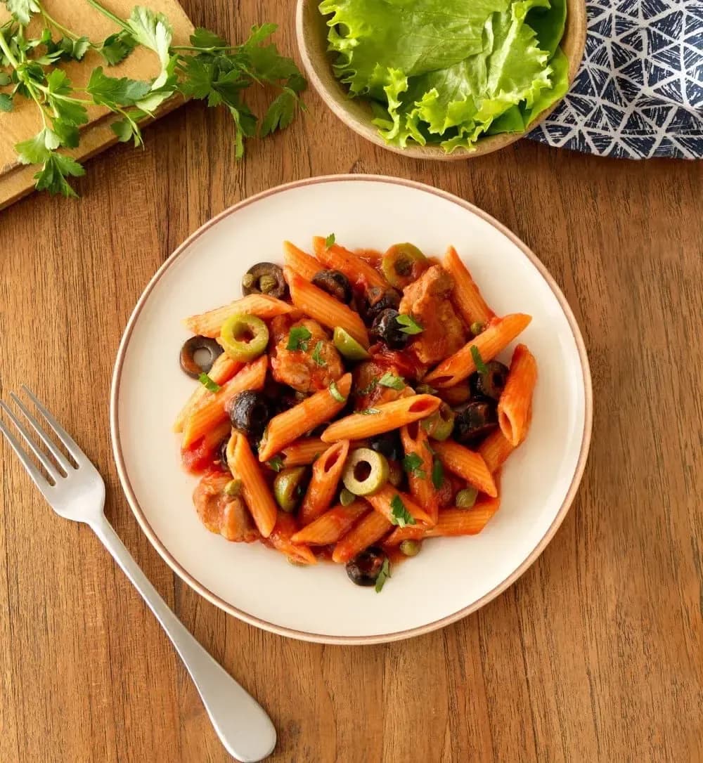 Barilla® Red Lentil Penne Pasta with Chicken in Zesty Tomato, Olive and Caper Sauce Recipe | US_PROD-d6c0ffb9-285d-4138-a701-b66fc26f01bd
