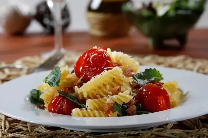 Barilla® Gluten Free Rotini Pasta with Crispy Pancetta, Cherry Tomatoes and Baby Kale Recipe | US_PROD-be24e48d-1ef5-4d85-b886-504a28395287