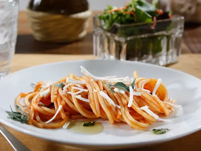Barilla® Thick Spaghetti with Marinara Sauce, Arugula and Parmigiano Cheese Recipe | US_PROD-73637eb0-625f-429d-8a92-bbb86940cffd