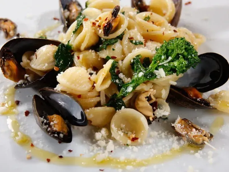 Barilla® Al Bronzo® Orecchiette Pasta with Rapini, Mussels and Romano Cheese Recipe | US_PROD-2885d7ab-d12f-4f4b-a526-1b27dad5b1c5