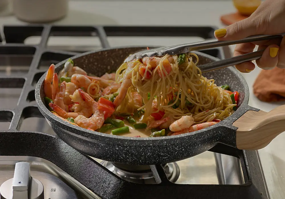 Barilla Pasta Mixed with Shrimp and Vegetables in a Pan