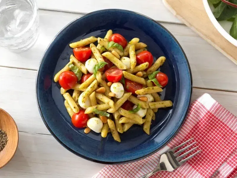 Barilla® Quick Penne Pesto with Tomatoes And Basil Leaves Recipe | US_PROD-d8ec7f75-0fbf-48fa-8e93-20123a15cca9