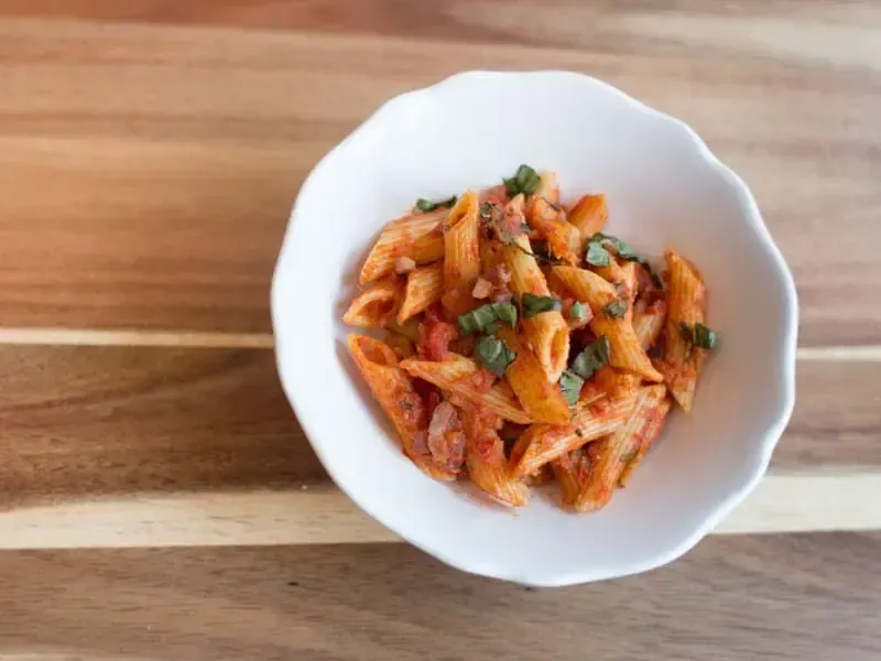 Barilla® Penne Pasta with Pancetta in a Creamy Tomato & Basil Sauce Recipe | US_PROD-e48c6576-756b-420c-8458-e7279f02df75