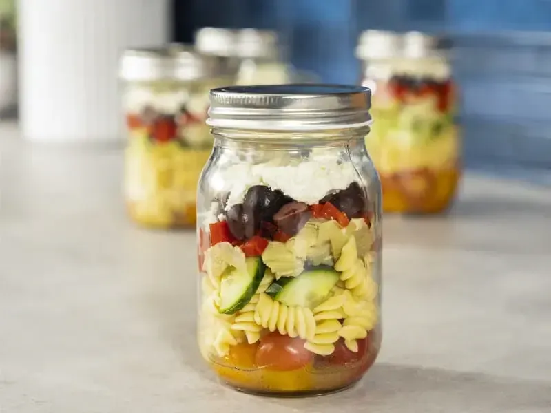 Barilla® Mason Jar Rotini Pasta Salad with Artichoke Hearts and Roasted Red Peppers Recipe | US_PROD-08643963-57f4-4f60-82dd-b6249c30d96e
