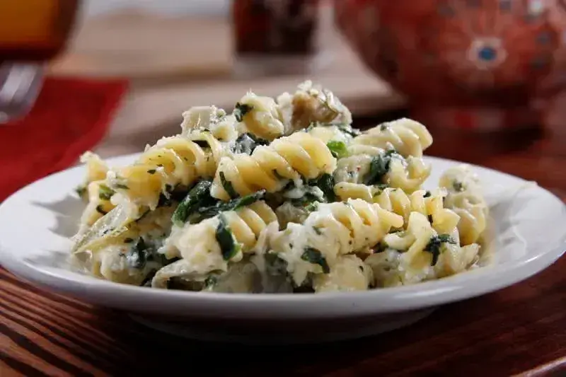 Baked Barilla® Rotini Pasta with Creamy Spinach and Artichoke Sauce Recipe | US_PROD-bfccc4b4-6fac-4dbc-a9ee-9049f69c6aa8