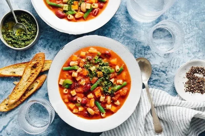 Minestrone Soup Recipe Drizzled with Barilla® Rustic Basil Pesto | US_PROD-1c439dd9-bc51-4605-967a-4664fb2554ef