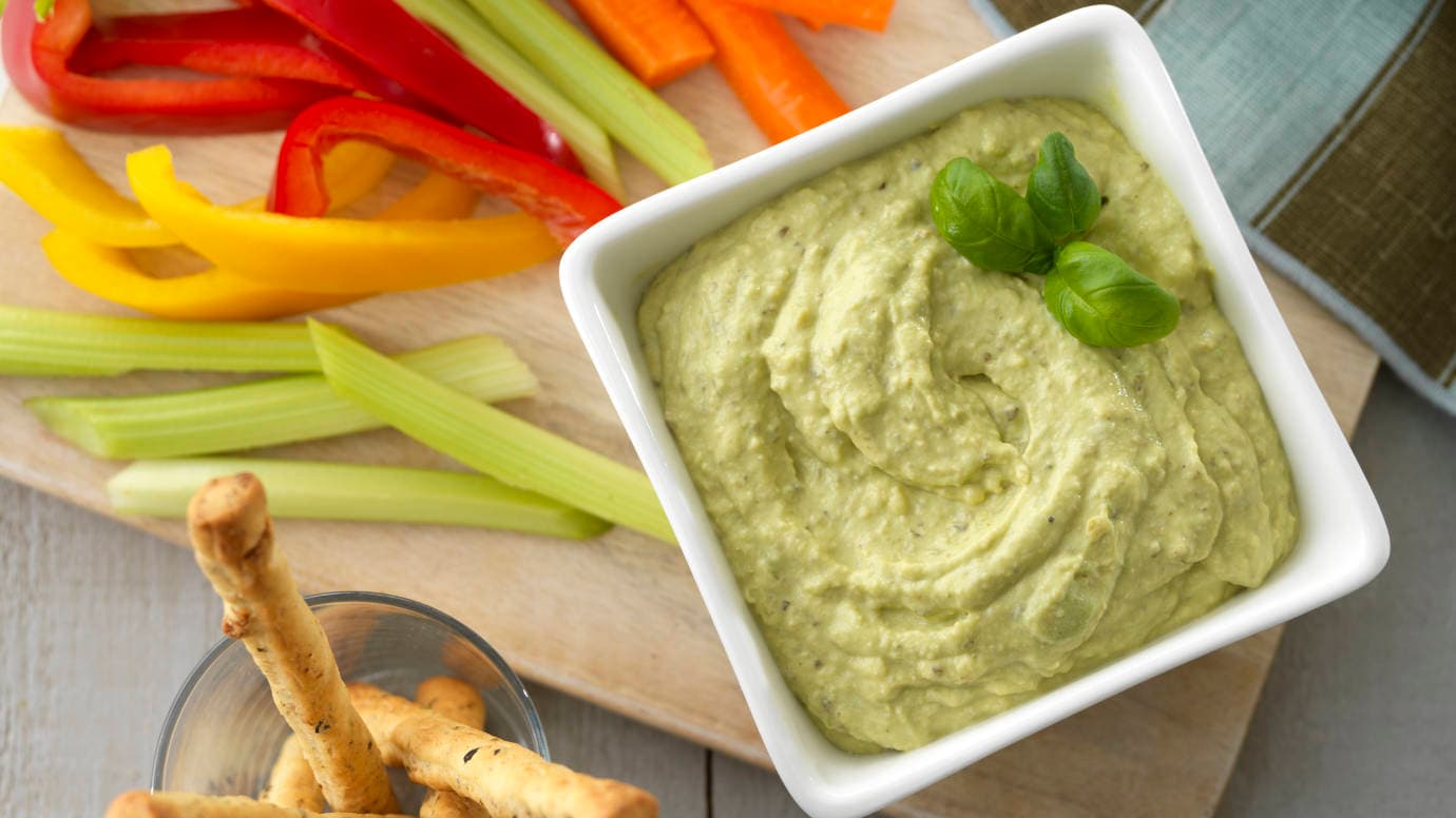 Creamy Ricotta and Basil Pesto avocado yogurt dip with fresh cut veggies | US_PROD-5tgdF0QlpC4sdV4yUOa5Bq