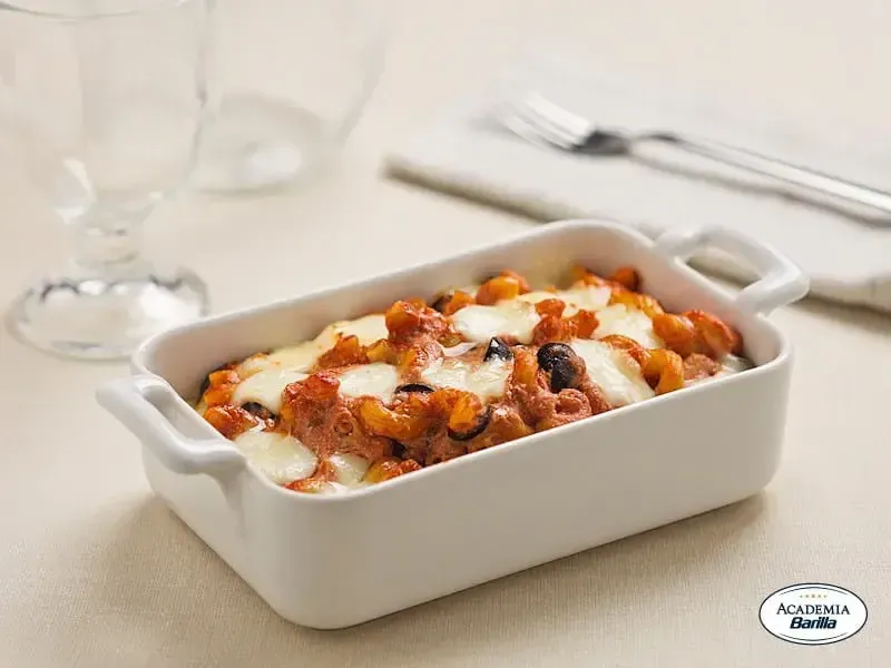 Barilla® Protein+® Elbows Baked with Cheese, Olives and Basil Recipe | US_PROD-420242f0-7dc0-425a-a9ca-47d7e37dbe79