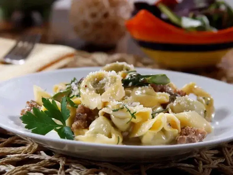 Barilla® Cheese and Spinach Tortellini Pasta with Sausage, Asparagus and Creamy Parmigiano-Reggiano Sauce Recipe | US_PROD-bc3b5bcb-49ae-4ef1-8add-9791be5565ad
