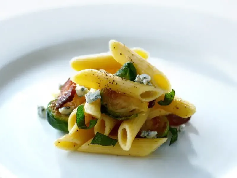 Barilla® Penne Pasta with Roasted Brussels Sprouts, Crispy Bacon and Crumbled Gorgonzola Recipe | US_PROD-8f6b8b07-501f-44f9-abe7-b745be10214b