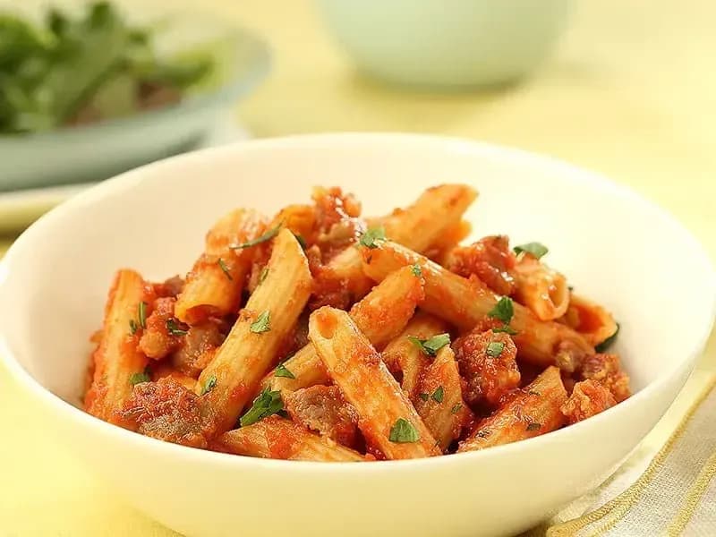 Whole Grain Penne Pasta with Italian Sausage in Barilla® Traditional Tomato Sauce Recipe | US_PROD-33d76a9f-c309-47f3-9890-0da810009a64