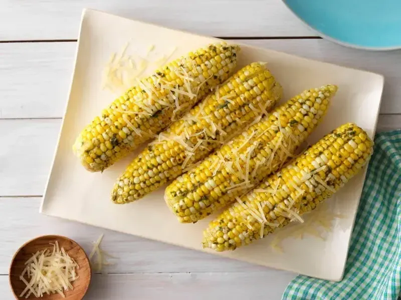 Roasted Corn with Barilla® Rustic Basil Pesto and Parmigiano Cheese Recipe | US_PROD-73026a63-5c11-454d-88c8-863868fe804e