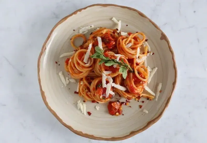 Barilla® Spaghetti with Tomatoes, Fresh Oregano and Romano Cheese Recipe | US_PROD-e0a92f0f-64dc-4463-bae4-70f2ce0b3a8b