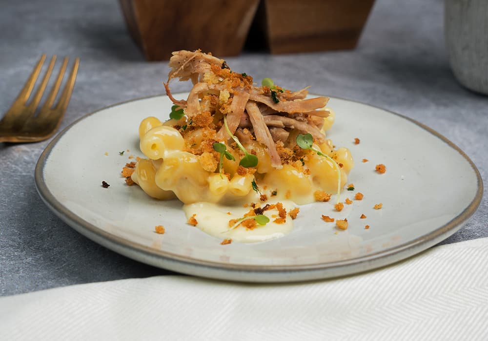 Barilla® Cellentani Pasta with Four Cheeses, Slow Cooked Pulled Pork, and Toasted Breadcrumbs Recipe | US_PROD-2EW6I2BRZ5ckRPOn7JQsyd