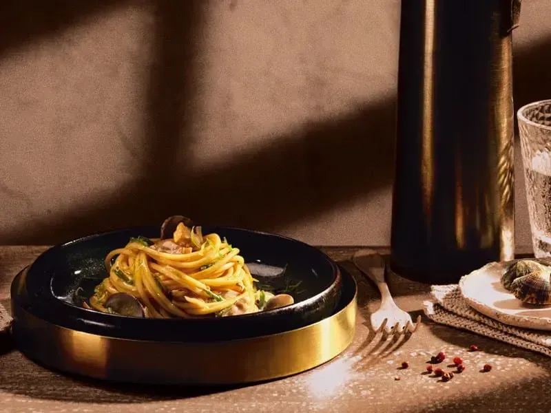 Barilla® Al Bronzo® Spaghetti Pasta with Clams, Chives and Lime Recipe | AAA-f14738f2-ecdb-4ca4-a78b-fb594fa09747