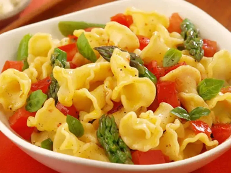 Barilla® Campanelle Pasta with Sautéed Asparagus, Diced Tomato and Basil Pasta Recipe | US_PROD-a17cb930-11be-435e-82e4-1f6f246656ad