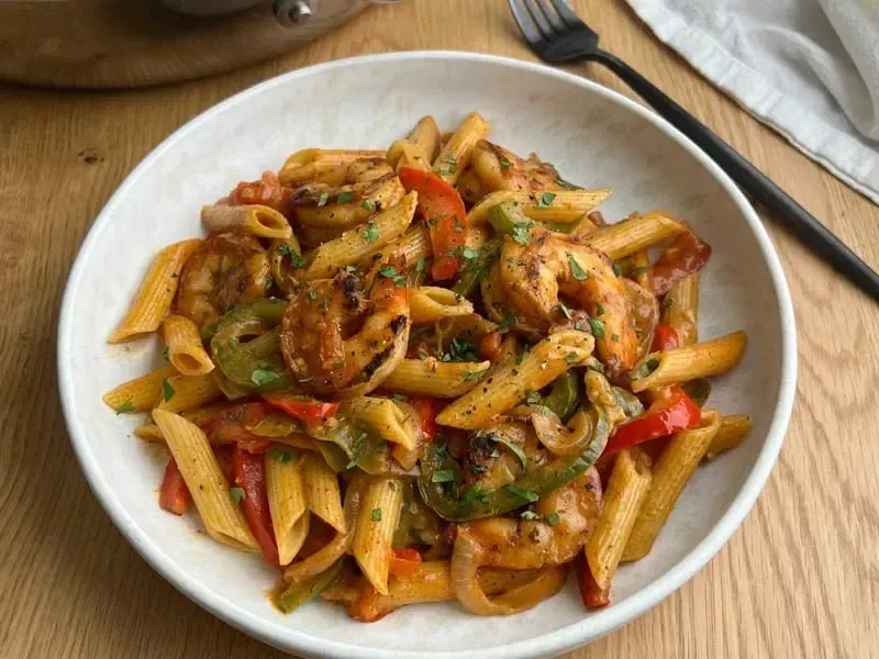 Barilla® One Pot Shrimp Fajita Penne Pasta with Yellow Onion and Cilantro Recipe | US_PROD-029c6a06-fa0d-4cb2-8cb4-dd8ef482cce3