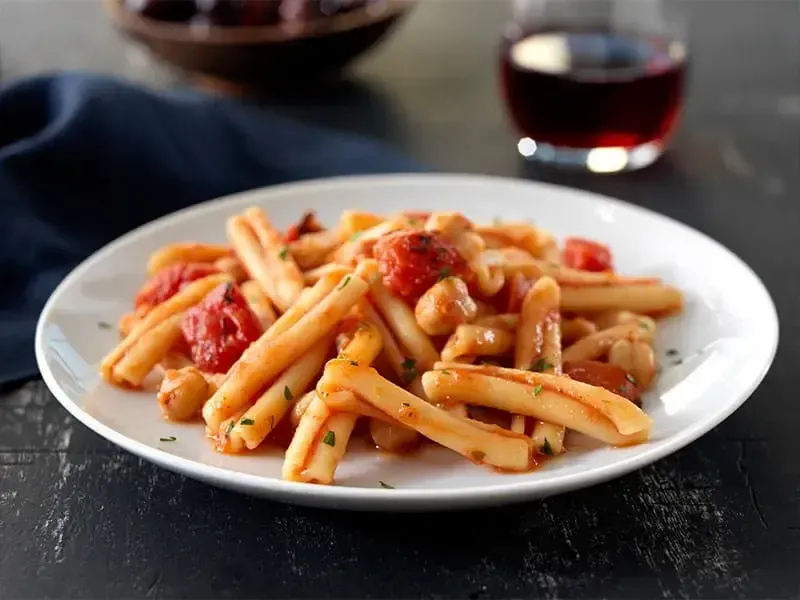 Barilla® Casarecce Pasta with Fire Roasted Tomatoes, Garbanzo Beans, Cipollini Onions and Parmigiano Cheese Recipe | US_PROD-4a470a25-d2c6-4a18-81a0-d599e34cdc86