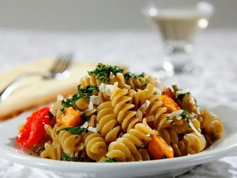 Barilla® Rotini Pasta with Roasted Butternut Squash, Cherry Tomatoes, Parmigiano Reggiano, and Crispy Kale Recipe | US_PROD-ee19d92e-a95f-4dff-8124-86ed064366e7