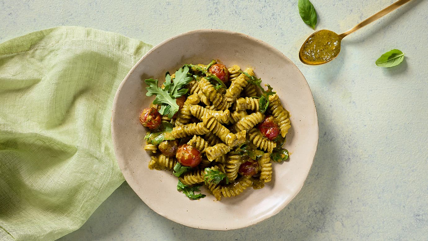 Rotini Pasta with Barilla® Vegan Pesto, Tomatoes and Arugula Recipe | US_PROD-5OiWR04sGZ8a6aVqlt2esn