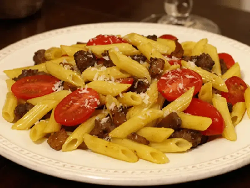 Barilla® Mini Penne Pasta with Sausage and Grape Tomatoes Recipe | US_PROD-e5d6ea2b-d26a-4240-ac89-dad7f5559010