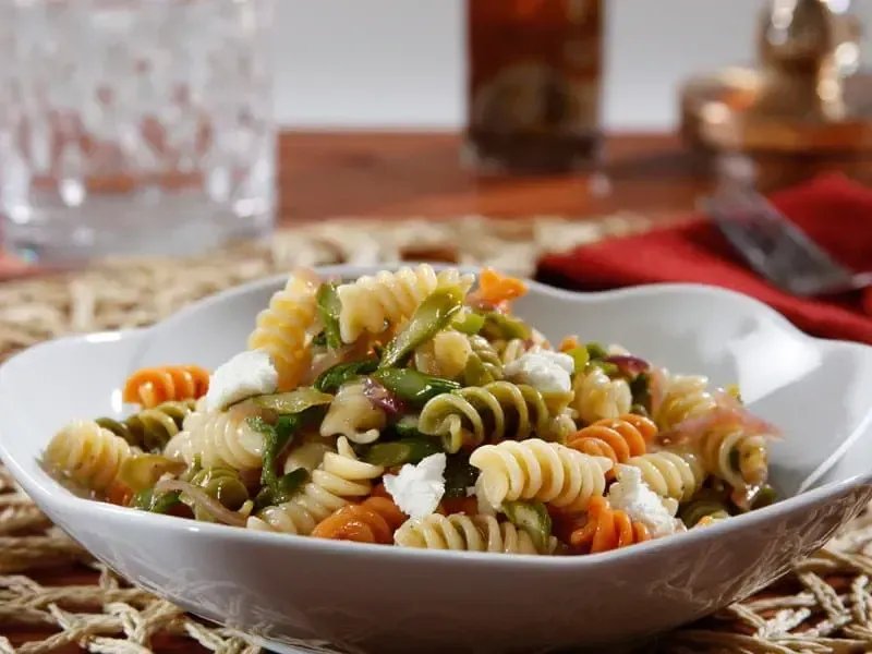 Barilla® Tri-Color Rotini Pasta Salad with Roasted Asparagus, Caramelized Red Onions and Goat Cheese Recipe | US_PROD-95347435-e2e8-4fd9-9d2b-c00f66d113a0
