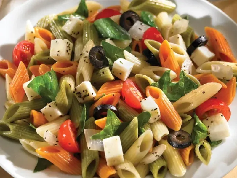 Barilla® Tri-Color Penne Pasta with Marinated Cherry Tomatoes and Cheese Recipe | US_PROD-5f8ebd21-a8e5-45f6-90c1-a25e93bf63c7