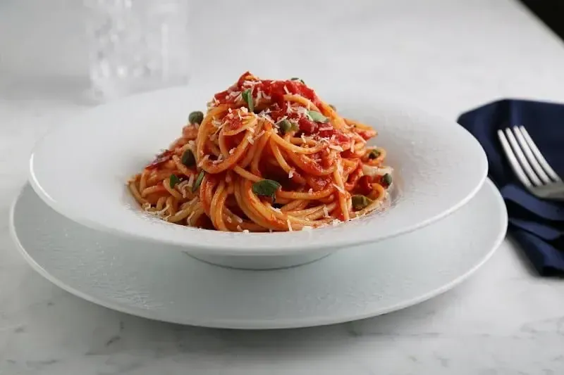 Barilla® Spaghetti with Tomato, Capers, Fresh Oregano, and Romano Recipe | US_PROD-85648532-8750-4c26-a1fd-4d0a47b13807