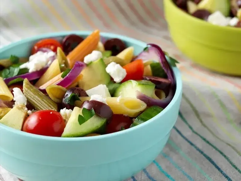 Barilla® Tri-Color Penne Pasta Salad with Feta Cheese, Olives, Cherry Tomatoes and Avocado Recipe | US_PROD-193ff485-325b-47f3-8885-30535b280291