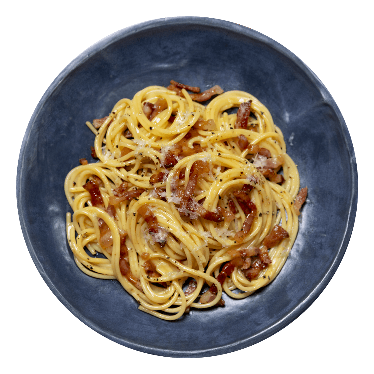 Carbonara sprinkled with cheese and pepper in a rustic blue bowl. | US_PROD-7ujaepWhXYZVgI1hRjPL9E