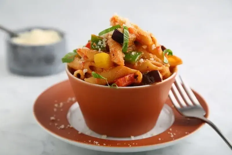Barilla® Mostaccioli with Tomato, Multicolor Bell Peppers, Eggplant Sauce and Fresh Ricotta Cheese Recipe | US_PROD-5bf90fde-f1d6-4771-a329-db43a2e66a4a