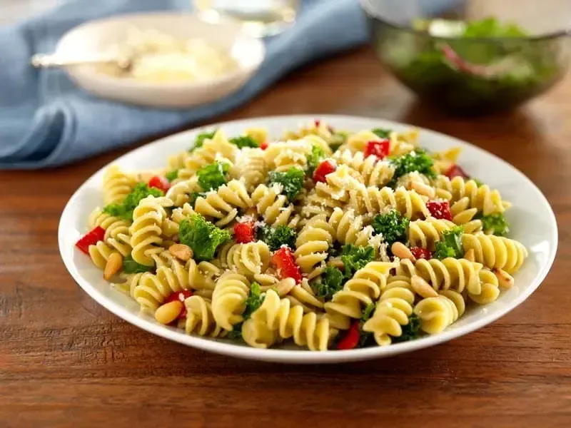 Barilla® Rotini Pasta with Kale, Roasted Peppers and Pine Nuts Recipe | US_PROD-94a6af86-c66c-4957-8faf-2f89860719fe