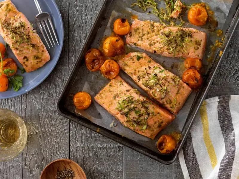 Sheet Pan Salmon with Barilla® Pesto, Yellow Tomatoes and Fresh Herbs Recipe | US_PROD-6923d84a-b0a1-436f-9c5a-2d804b4da76e
