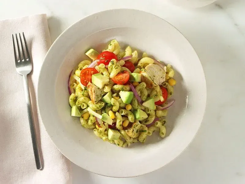 Barilla® Pesto Pasta Salad with Avocado & Chicken, Red Onion and Cherry Tomatoes Recipe