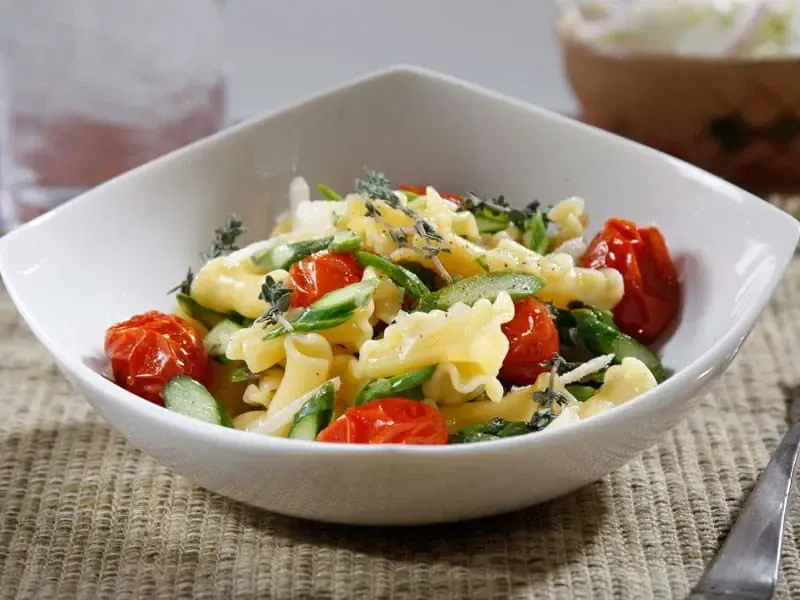 Barilla® Campanelle Pasta with Asparagus, Caramelized Grape Tomatoes and Parmigiano Cheese Recipe | US_PROD-1bc21340-cb94-44b1-b111-176c1693de59