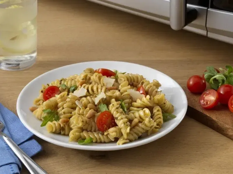 Quick & Easy Pasta Pesto with Arugula and Tomatoes Recipe Made with Barilla® Ready Pasta Rotini | US_PROD-e18b28a3-f04f-4feb-b18f-2094018679b6