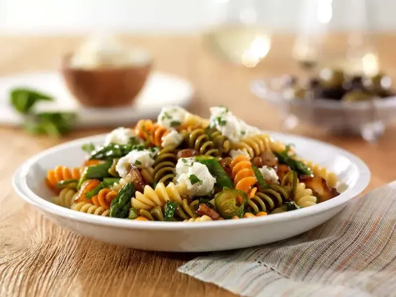 Barilla® Tri-Color Rotini Pasta with Asparagus, Caramelized Vidalia Onions, Serrano Pepper and Mint Recipe | US_PROD-e4c6cb1e-c109-409d-90c0-6a41eefe067c