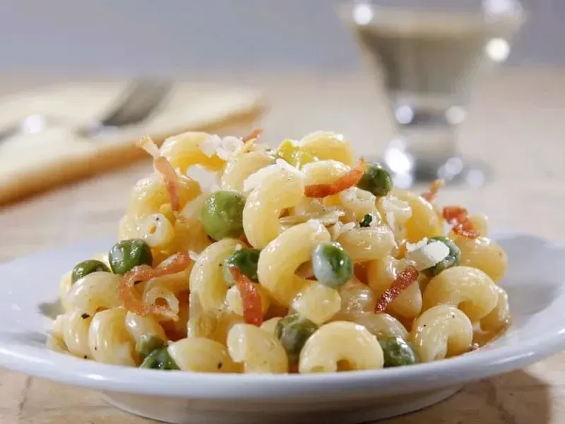 Barilla® Cellentani Pasta with Leeks, Crispy Pancetta and Green Peas Recipe | US_PROD-e71ba27d-6ebc-47f6-852f-19268d6b464b