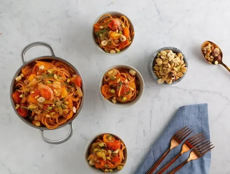 Barilla® Red Lentil Spaghetti with Shallots, Multicolor Tomatoes and Toasted Nuts Recipe | US_PROD-6c123d79-ec29-4774-8bb9-8e7176880873