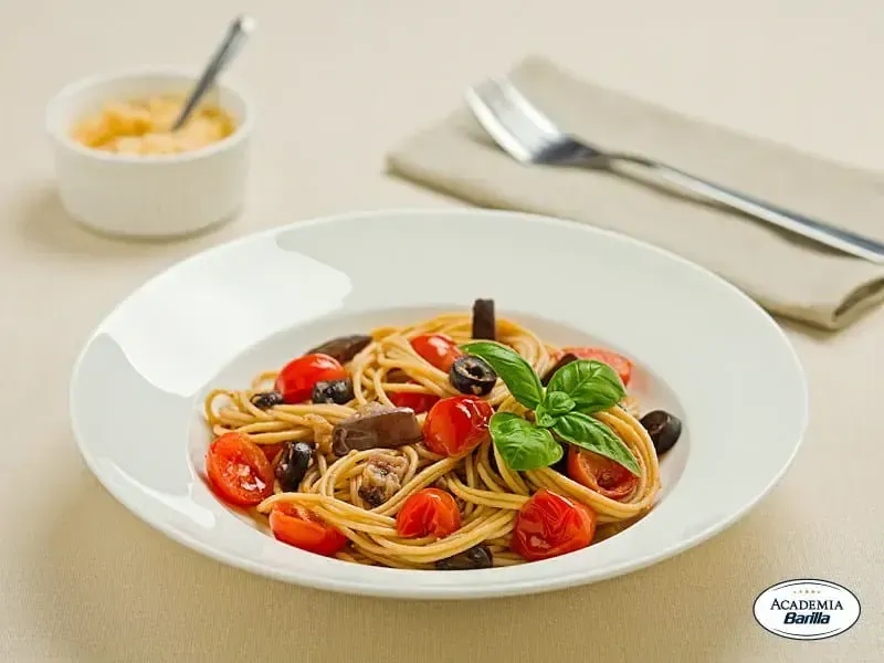 Barilla® Protein+® Spaghetti with Eggplant, Cherry Tomatoes, Olives and Pecorino Cheese Recipe | US_PROD-41bf8ba1-e0c6-47d1-9b07-8db38e244c5b