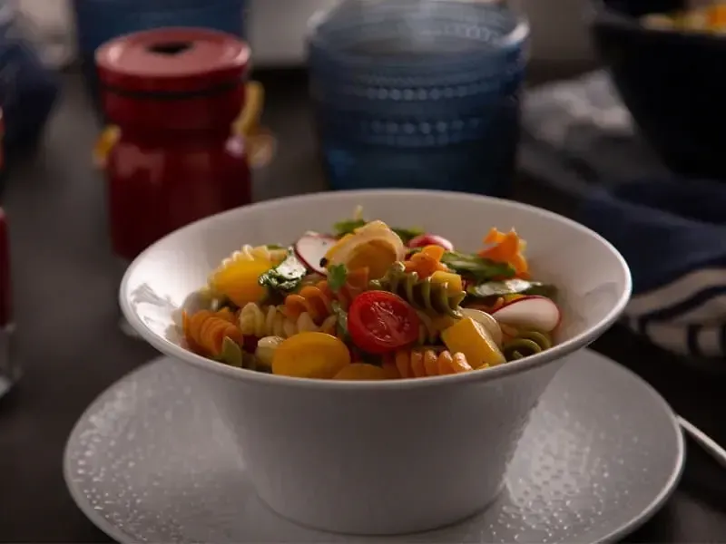 Barilla® Easy Tri-Color Rotini Pasta Salad with Sautéed Onion, Cherry Tomatoes and Spicy Basil Leaves Recipe | US_PROD-b976644f-8541-4077-8ba3-fdefad38539c