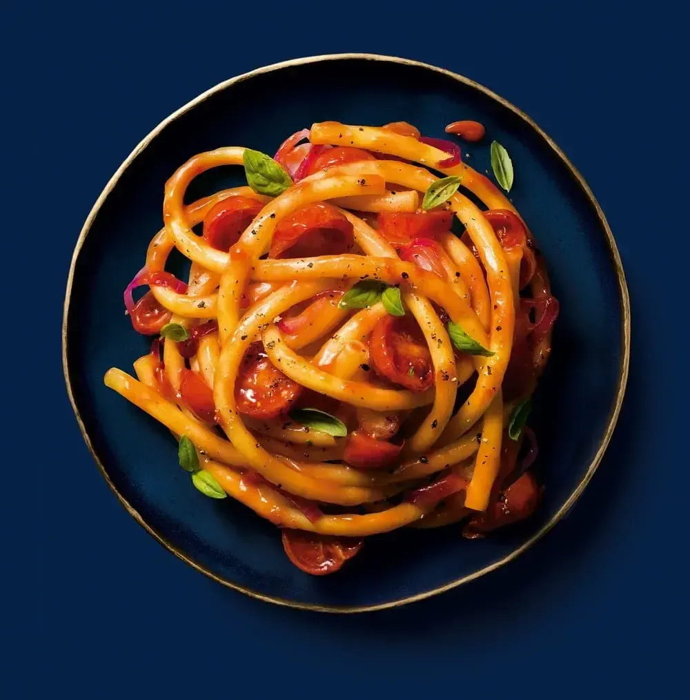 Barilla® Bucatini Pasta with Tomato, Red Onion and Basil Recipe | US_PROD-b776f68e-b510-41a5-acf7-b8d28216f830